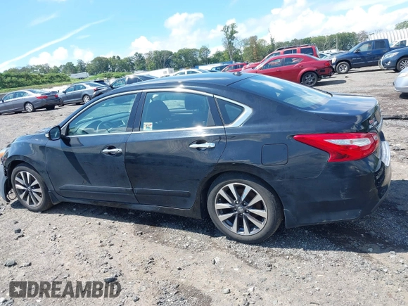 2017 Nissan Altima SV with VIN 1N4AL3AP0HC144575, listed as a IAAI auction lot 40129580 with 184,765 mi miles and . Bid and sale history available at DreamBid. Image 14.