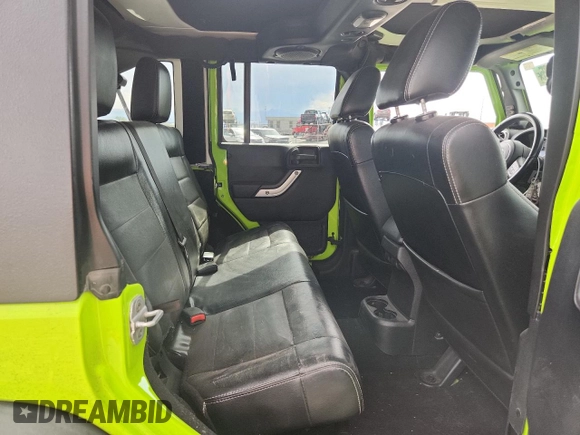 2012 Jeep Wrangler Unlimited Call of Duty MW3 z VIN 1C4BJWFG4CL242211, wystawiony jako Copart lot #59774555 z przebiegiem 117 463 mil mil oraz Szkoda całkowita • Salvage title. Historia ofert i sprzedaży dostępna na DreamBid. Obrazek 10.