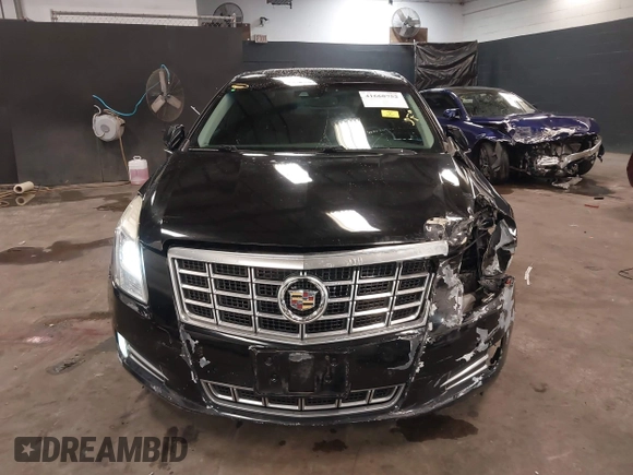 2013 Cadillac XTS Luxury z VIN 2G61R5S34D9102625, wystawiony jako IAAI lot #41668752 z przebiegiem 112 065 mil mil oraz . Historia ofert i sprzedaży dostępna na DreamBid. Obrazek 12.