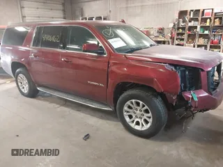 2017 GMC Yukon XL SLT with VIN 1GKS2GKC4HR119541, listed as a IAAI auction lot 41406162 with 242,476 mi miles. Bid and sale history available at carsss.com. Image 1.