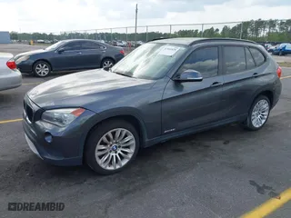 2014 BMW X1 sDrive28i with VIN WBAVM1C52EVW56134, listed as a IAAI auction lot 41941829 with 85,839 mi miles. Bid and sale history available at carsss.com. Image 2.
