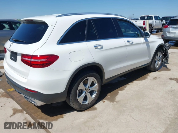 2018 Mercedes-Benz GLC 300 with VIN WDC0G4JB9JV056407, listed as a IAAI auction lot 41965217 with 77,228 mi miles and . Bid and sale history available at DreamBid. Image 4.