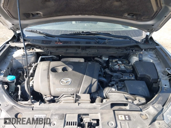 2014 Mazda CX-5 Grand Touring with VIN JM3KE4DY7E0311893, listed as a IAAI auction lot 42090872 with 102,154 mi miles and . Bid and sale history available at DreamBid. Image 10.