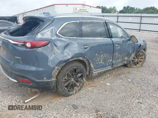 2021 Mazda CX-9 Grand Touring with VIN JM3TCADY2M0509286, listed as a IAAI auction lot 39976279 with 93,588 mi miles and . Bid and sale history available at DreamBid. Image 4.