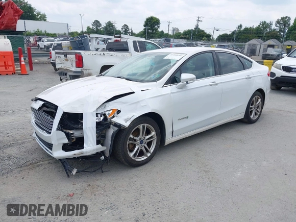 2015 Ford Fusion SE Hybrid with VIN 3FA6P0LU2FR305597, listed as a IAAI auction lot 42168292 with 97,688 mi miles and . Bid and sale history available at DreamBid. Image 2.