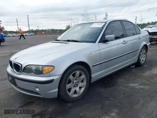 2005 BMW 3 Series 325i with VIN WBAAZ33415KW79070, listed as a IAAI auction lot 41708871 with 148,876 mi miles. Bid and sale history available at carsss.com. Image 2.