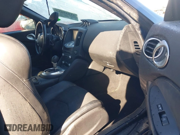 2014 Nissan 370Z Nismo with VIN JN1AZ4EH9EM635608, listed as a IAAI auction lot 41333034 with 45,354 mi miles and . Bid and sale history available at DreamBid. Image 5.