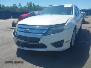 2012 Ford Fusion SEL z VIN 3FAHP0JG1CR167326, wystawiony jako IAAI lot #42320109 z przebiegiem 117 381 mil mil oraz . Historia ofert i sprzedaży dostępna na DreamBid. Obrazek 6.