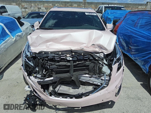 2023 Cadillac XT5 FWD Premium Luxury z VIN 1GYKNCR45PZ160005, wystawiony jako Copart lot #59147325 z przebiegiem 70 322 mil mil oraz Szkoda całkowita • Salvage title. Historia ofert i sprzedaży dostępna na DreamBid. Obrazek 5.