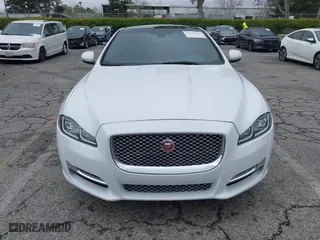 2016 Jaguar XJ with VIN SAJWA2GE3GMV93216, listed as a IAAI auction lot 41890225 with 70,007 mi miles. Bid and sale history available at carsss.com. Image 13.