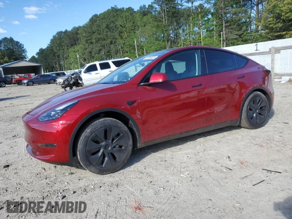 2024 Tesla Model Y Long Range with VIN 7SAYGDEE6RA318973, listed as a Copart auction lot 55586435 with 8,700 mi miles and Salvage title. Bid and sale history available at DreamBid. Image 1.