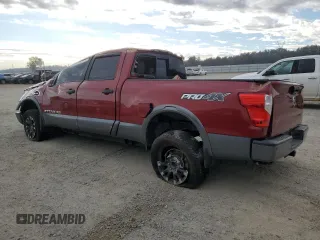2017 Nissan Titan XD SV with VIN 1N6BA1F45HN571372, listed as a Copart auction lot 76906434 with 103,274 mi miles and Salvage Title. Bid and sale history available at carsss.com. Image 2.