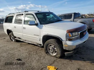 2004 GMC Yukon XL SLT with VIN 3GKGK26G04G233021, listed as a Copart auction lot 42993595 with 144,425 mi miles and Salvage Title. Bid and sale history available at carsss.com. Image 4.