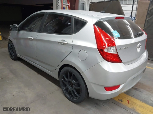 2013 Hyundai Accent GL with VIN KMHCT5AE3DU104651, listed as a IAAI auction lot 41522571 with 147,324 mi miles. Bid and sale history available at carsss.com. Image 3.