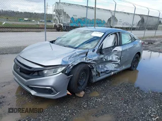 2019 Honda Civic LX with VIN 19XFC2F61KE009471, listed as a IAAI auction lot 42017532 with 81,134 mi miles and . Bid and sale history available at DreamBid. Image 17.