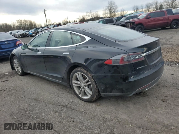 2014 Tesla Model S 60 with VIN 5YJSA1H18EFP45810, listed as a Copart auction lot 86313244 with Not Provided miles and Salvage Title. Bid and sale history available at DreamBid. Image 2.