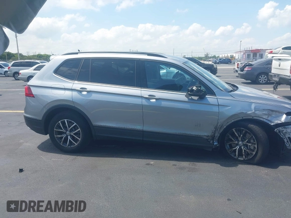 2021 Volkswagen Tiguan S with VIN 3VV1B7AX7MM117954, listed as a IAAI auction lot 42300223 with 45,587 mi miles and . Bid and sale history available at DreamBid. Image 13.