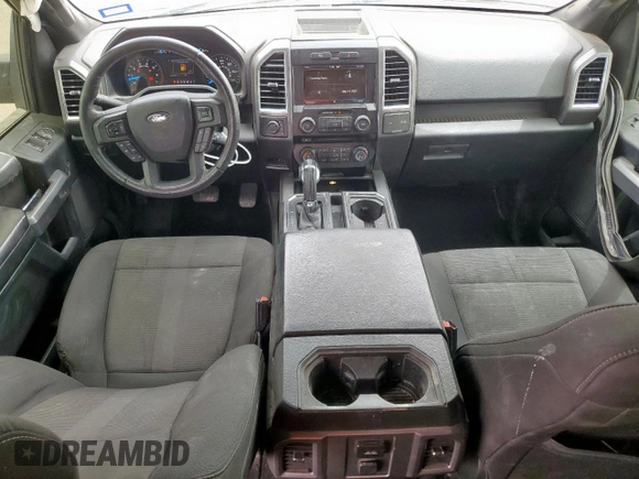 2015 Ford F-150 XLT with VIN 1FTEW1EF6FKD20492, listed as a Copart auction lot 57122105 with 126,576 mi miles and Salvage title. Bid and sale history available at DreamBid. Image 8.
