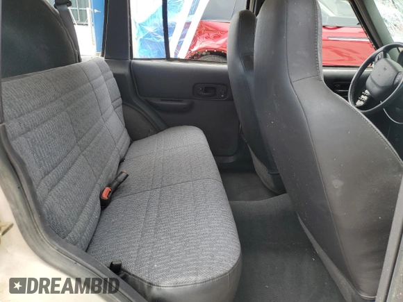 2001 Jeep Cherokee Sport с VIN 1J4FT48S21L607090, выставлен на аукционе Copart как лот 50123995 с пробегом 146 120 миль миль и Списание • Salvage title. История ставок и продаж доступна на DreamBid. Изображение 11.