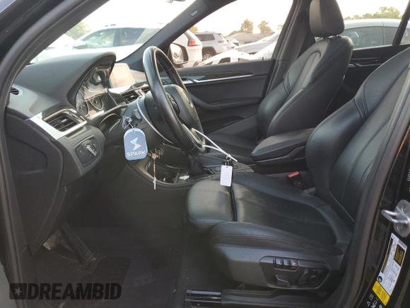 2018 BMW X1 xDrive28i with VIN WBXHT3C33J5F90612, listed as a Copart auction lot 74937654 with 72,561 mi miles and Salvage Title. Bid and sale history available at carsss.com. Image 7.