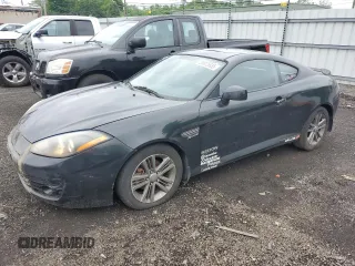 2008 Hyundai Tiburon GS z VIN KMHHM66D08U266025, wystawiony jako Copart lot #59875935 z przebiegiem 161 271 mil mil oraz Szkoda całkowita • Salvage title. Historia ofert i sprzedaży dostępna na DreamBid. Obrazek 1.
