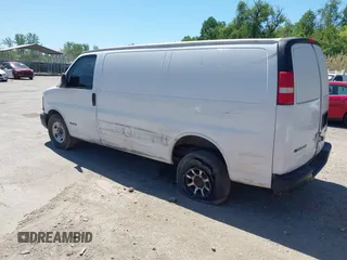 2004 Chevrolet Express Cargo Van with VIN 1GCGG25V441118708, listed as a IAAI auction lot 42144915 with 327,928 mi miles. Bid and sale history available at carsss.com. Image 3.
