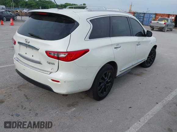 2015 Infiniti QX60 with VIN 5N1AL0MM6FC543767, listed as a IAAI auction lot 42409275 with 128,128 mi miles and . Bid and sale history available at DreamBid. Image 4.