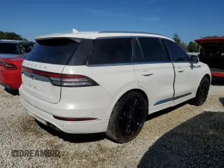2021 Lincoln Aviator Reserve z VIN 5LM5J7WCXMGL18310, wystawiony jako Copart lot #76247904 z przebiegiem 69 111 mil mil oraz Nie do naprawy • Non repairable. Historia ofert i sprzedaży dostępna na DreamBid. Obrazek 3.
