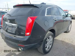 2013 Cadillac SRX Luxury Collection with VIN 3GYFNCE33DS617143, listed as a IAAI auction lot 41876084 with 102,512 mi miles. Bid and sale history available at carsss.com. Image 4.