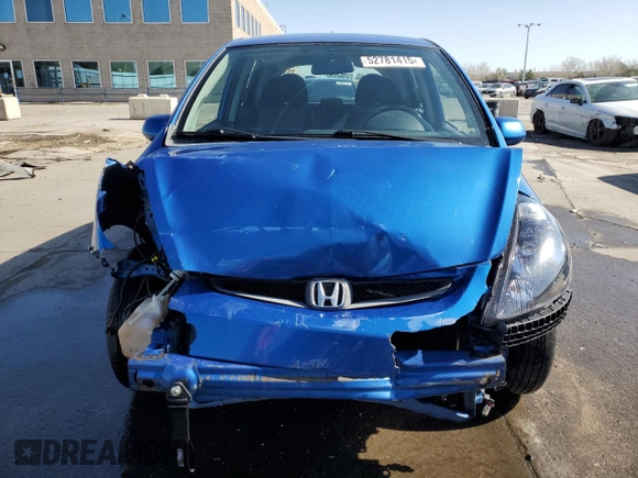 2007 Honda Fit Sport with VIN JHMGD38607S004236, listed as a Copart auction lot 52781415 with 313,559 mi miles and Salvage Title. Bid and sale history available at carsss.com. Image 5.