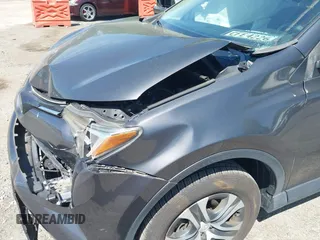2016 Toyota RAV4 LE with VIN JTMZFREV7GJ086149, listed as a IAAI auction lot 42064251 with 90,104 mi miles and . Bid and sale history available at DreamBid. Image 6.