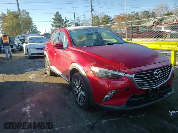 2018 Mazda CX-3 Grand Touring z VIN JM1DKFD75J0319224, wystawiony jako Copart lot #87504495 z przebiegiem 47 466 mil mil oraz Szkody całkowita. Historia ofert i sprzedaży dostępna na DreamBid. Obrazek 11.