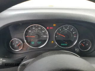 2013 Jeep Wrangler Sport z VIN 1C4AJWAG3DL574449, wystawiony jako Copart lot #58001535 z przebiegiem 35 533 mil mil oraz Szkoda całkowita • Salvage title. Historia ofert i sprzedaży dostępna na DreamBid. Obrazek 9.