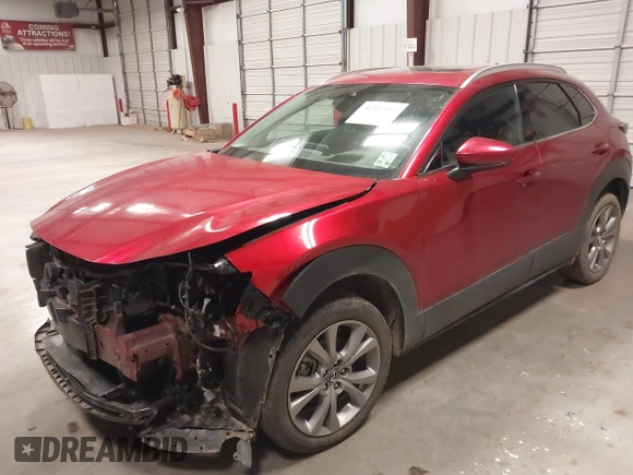2021 Mazda CX-30 Premium with VIN 3MVDMADL8MM320149, listed as a IAAI auction lot 41317680 with 47,383 mi miles and . Bid and sale history available at DreamBid. Image 2.