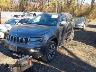 2018 Jeep Grand Cherokee Limited with VIN 1C4RJFBG6JC246293, listed as a IAAI auction lot 40846527 with 114,544 mi miles and . Bid and sale history available at DreamBid. Image 2.