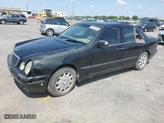 2001 Mercedes-Benz E-Class with VIN WDBJF65J01B225871, listed as a Copart auction lot 66136994 with 2,139,454 mi miles and Clean Title. Bid and sale history available at carsss.com. Image 1.