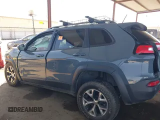 2014 Jeep Cherokee Trailhawk with VIN 1C4PJMBS5EW134900, listed as a IAAI auction lot 41997316 with 96,445 mi miles. Bid and sale history available at carsss.com. Image 14.