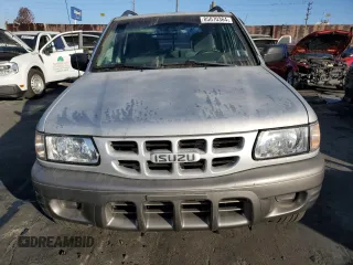 2000 Isuzu Rodeo S z VIN 4S2CK58W2Y4311726, wystawiony jako Copart lot #85070364 z przebiegiem 226 510 mil mil oraz Szkody całkowita. Historia ofert i sprzedaży dostępna na DreamBid. Obrazek 5.
