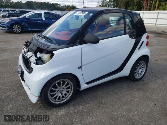 2011 Smart fortwo Pure with VIN WMEEJ3BAXBK447292, listed as a Copart auction lot 73308384 with 35,166 mi miles and Salvage title. Bid and sale history available at DreamBid. Image 1.