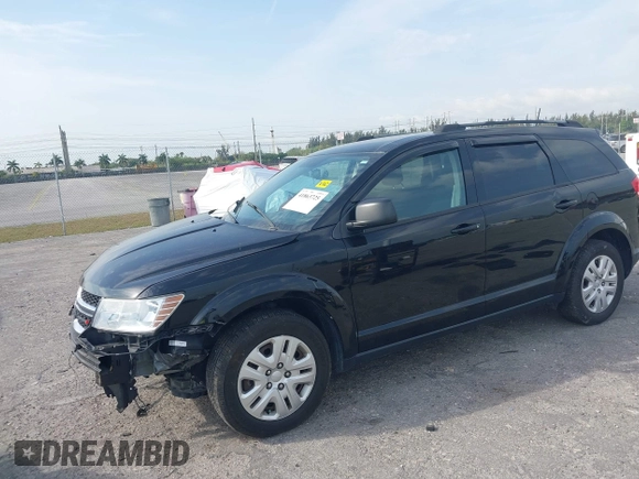 2017 Dodge Journey SE with VIN 3C4PDCAB4HT691343, listed as a IAAI auction lot 41863725 with 99,519 mi miles and . Bid and sale history available at carsss.com. Image 2.