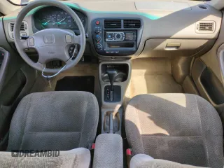 2000 Honda Civic LX with VIN 1HGEJ6673YL047996, listed as a Copart auction lot 51451505 with 216,329 mi miles and Clean Title. Bid and sale history available at DreamBid. Image 8.