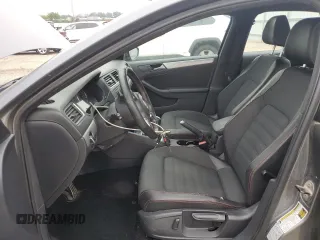 2014 Volkswagen Jetta GLI z VIN 3VW4T7AJ2EM245201, wystawiony jako Copart lot #64901935 z przebiegiem 147 799 mil mil oraz Czysty tytuł • Clean title. Historia ofert i sprzedaży dostępna na DreamBid. Obrazek 7.