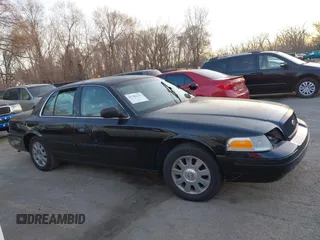 2001 Ford Crown Victoria Police Police Interceptor with VIN 2FAFP71W91X190763, listed as a IAAI auction lot 41781221 with 181,087 mi miles. Bid and sale history available at carsss.com. Image 14.