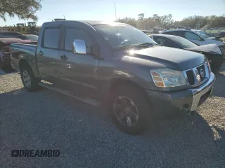 2007 Nissan Titan XE with VIN 1N6BA07A17N243282, listed as a Copart auction lot 41391925 with 158,843 mi miles and Salvage Title. Bid and sale history available at carsss.com. Image 4.