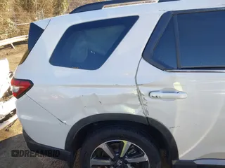 2024 Honda Pilot Touring with VIN 5FNYG2H7XRB016877, listed as a IAAI auction lot 41496013 with 18,213 mi miles and . Bid and sale history available at DreamBid. Image 14.