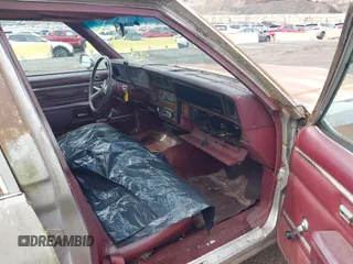 1984 Chevrolet Caprice z VIN 2G1AN35H3E9181574, wystawiony jako IAAI lot #42374841 z przebiegiem 109 435 mil mil oraz . Historia ofert i sprzedaży dostępna na DreamBid. Obrazek 5.