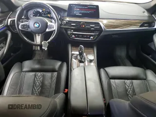 2018 BMW 5 Series M550i xDrive with VIN WBAJB9C55JB050213, listed as a Copart auction lot 61714255 with 34,700 mi miles and Salvage title. Bid and sale history available at DreamBid. Image 8.