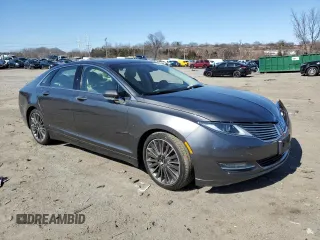 2015 Lincoln MKZ z VIN 3LN6L2JK1FR604092, wystawiony jako Copart lot #48379525 z przebiegiem 64 656 mil mil oraz Szkoda całkowita • Salvage title. Historia ofert i sprzedaży dostępna na DreamBid. Obrazek 4.