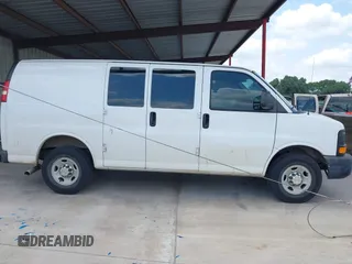 2013 Chevrolet Express Cargo Van with VIN 1GCWGFBAXD1168680, listed as a IAAI auction lot 42113126 with 162,376 mi miles. Bid and sale history available at carsss.com. Image 12.
