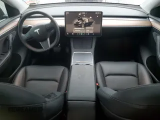 2024 Tesla Model Y с VIN 7SAYGDED9RF195941, выставлен на аукционе Copart как лот 58372205 с пробегом 12 289 миль миль и Списание • Salvage title. История ставок и продаж доступна на DreamBid. Изображение 8.